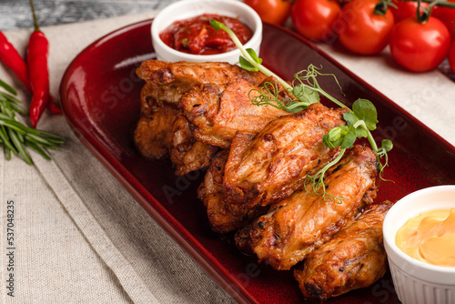 Chicken wings, chicken wings appetizer on a wooden white background