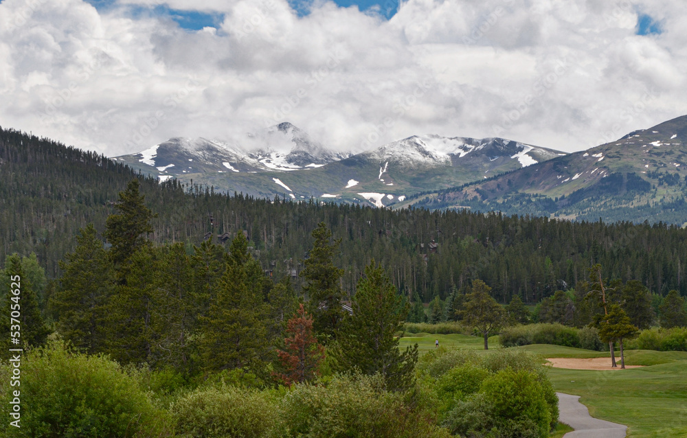 scenic view of snow covered Tenmile Peak in Rocky Mountains from Rounds Park (Breckenridge, CO)