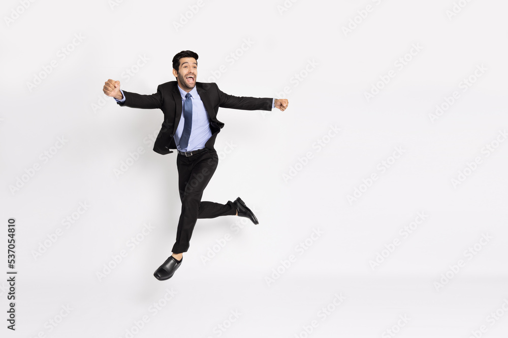 Young businessman jumping in air isolated on white background, Full length composition