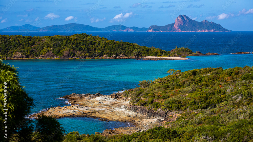 panorama of the whitsunday islands as seen from the top of a mountain near whitehaven beach; famous beaches with white sand and turquoise water; paradise islands in queensland, australia