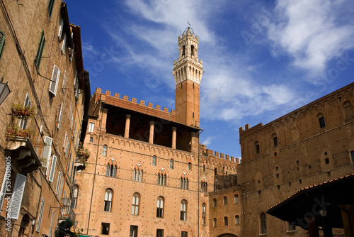 The rear of the Palazzo Pubblico, with the Loggia dei Nove, and the Torre del Mangia, from Piazza del Mercato, Siena, Tuscany, Italy