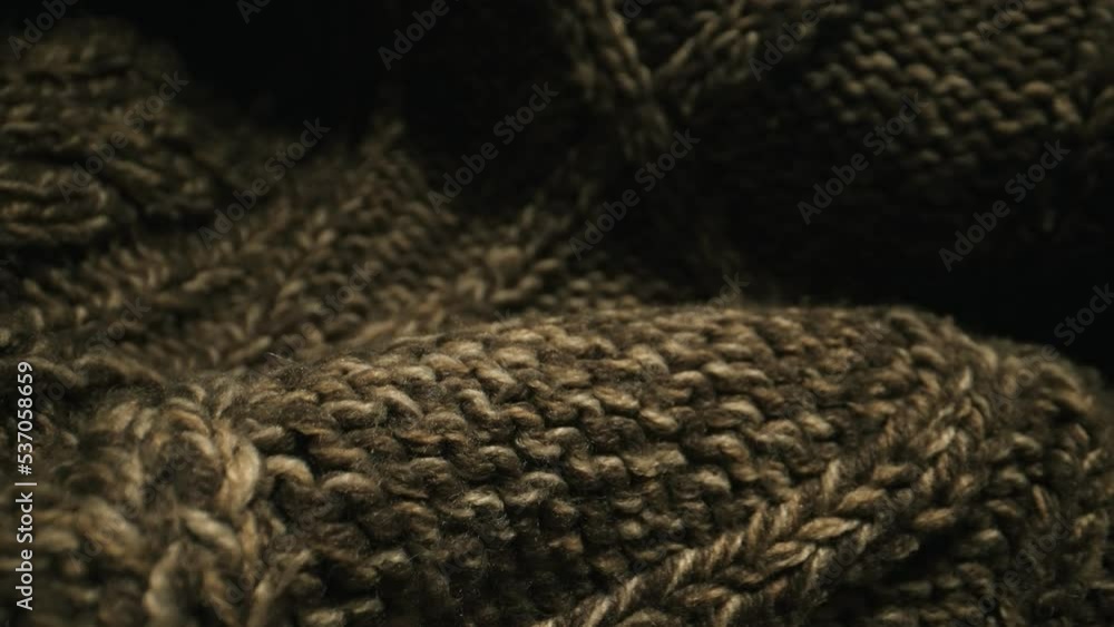 Knitted warm wool sweater. Close-up. Knitted warm wool sweater. Close-up.