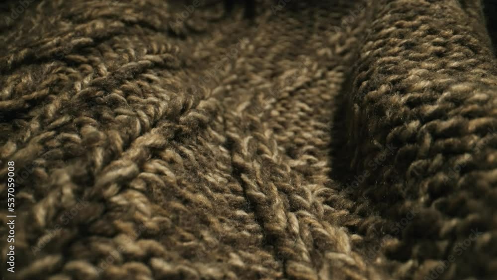 Knitted warm wool sweater. Close-up. Knitted warm wool sweater. Close-up.