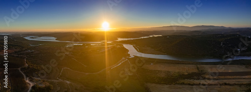Aerial panoramic view of Algarve countryside landscape, above Arade river in Silves, a Popular Nature Destination Region, in South Portugal.