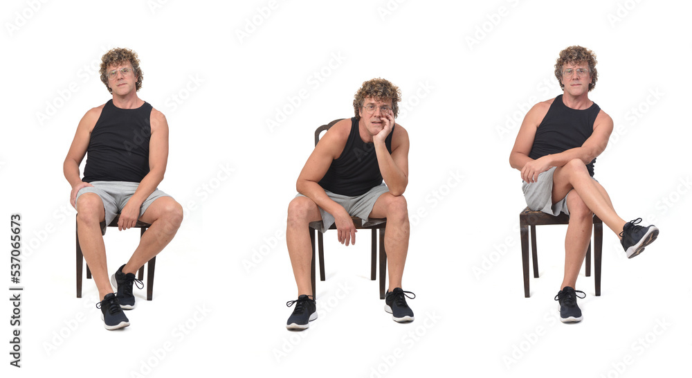  front view of same man with sportswear sitting on chair on white background
