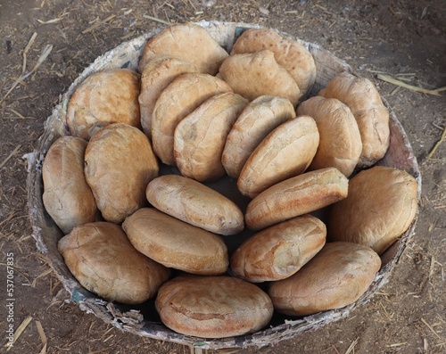 Egyptian sun bread (Eish shamsi) in rural village near Luxor, Upper Egypt photo