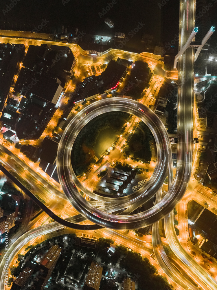 Aerial view of Nanpu bridge intersection in Shanghai at night. Aerial view of Nanpu bridge intersection in Shanghai at night.