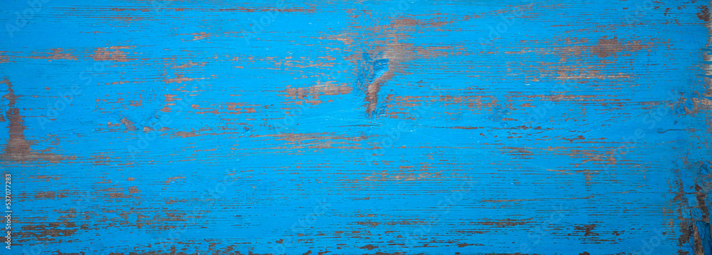 Rectangular wooden background in blue color. Vintage wood texture painted with blue paint.