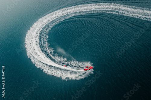 Aerial view of friends having fun on jet-ski and sup board, Vladivostok, Russia. photo