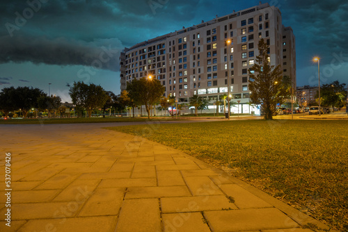 Night view of architecture and streets in Teatinos district in Málaga photo