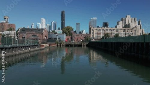 rising over Gowanus Canal aerial shot of downtown Brookyn photo