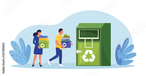 Cloth recycling. People put, sorting clothes in urban street container for social humanitarian aid. Recycled fabric, textile and eco friendly production. Volunteers donating to charity. Garment reuse