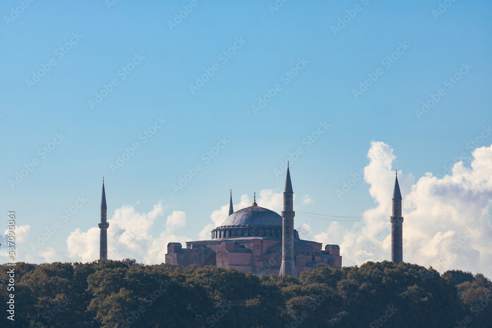 Hagia Sophia with beautiful white clouds and blue sky.