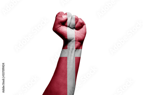 Man's hand in a fight signal with the countries flag. photo