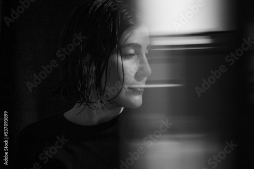 creative portrait of a young woman looking for an emotion of drama