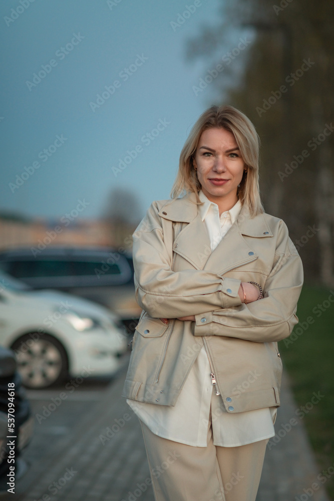 Fototapeta premium Portrait of a young beautiful blonde girl. There is artistic noise.