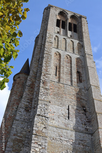 Exterior view of the tower of Our Lady's Asumption Chuch in Damme, West Flanders, Belgium. photo