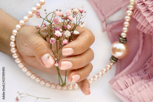 Foto hand with pearls