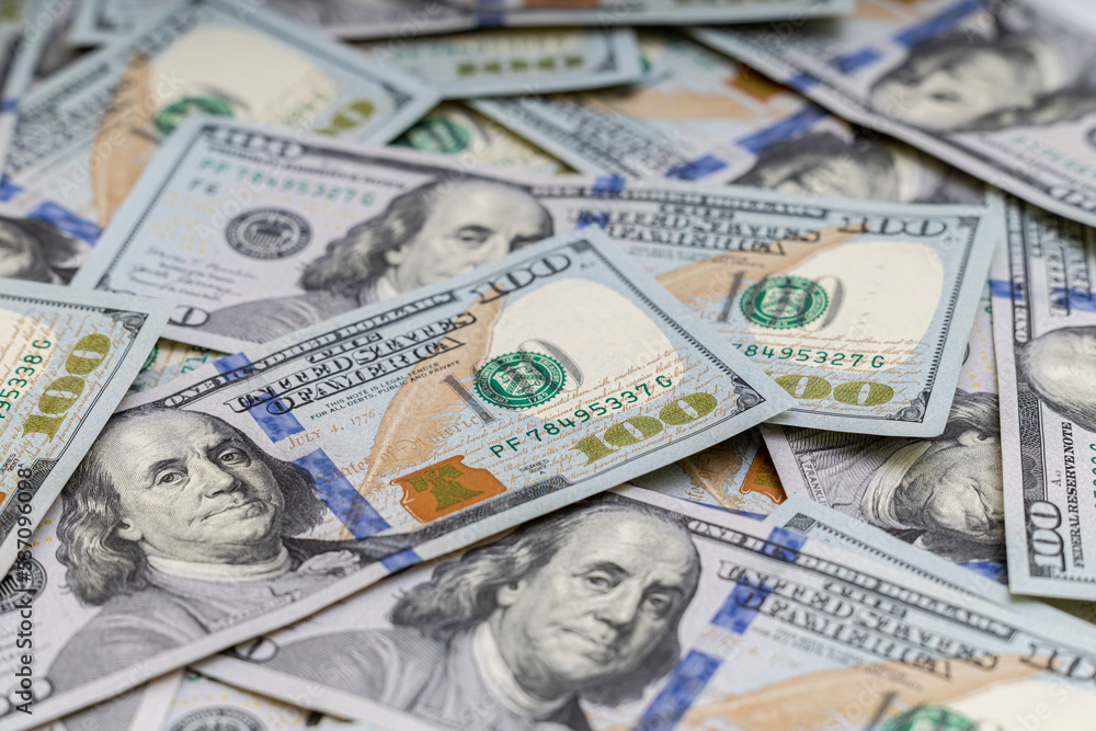 background of US dollar bills lying on the surface background of US dollar bills lying on the surface