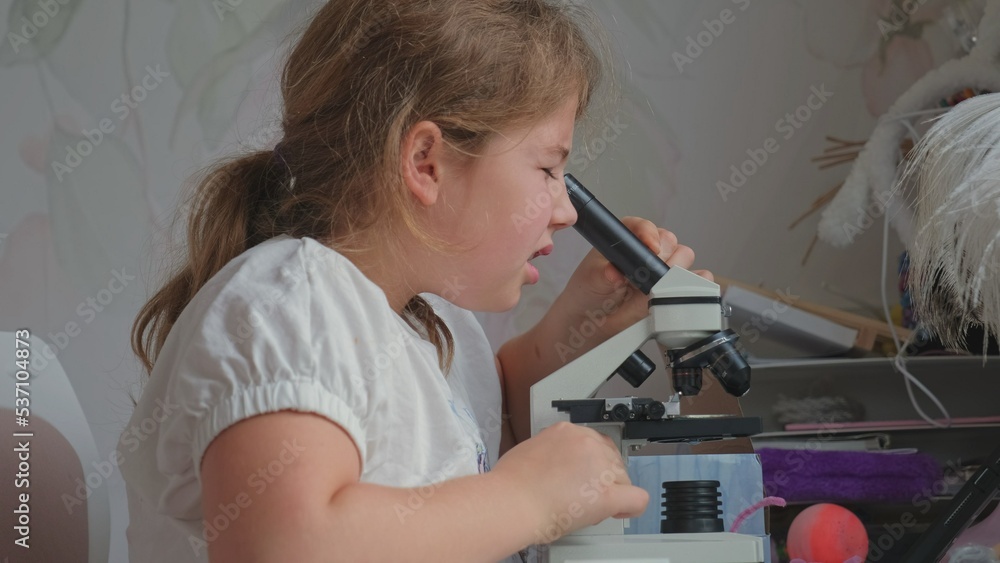 Young Intelligent Curious Caucasian Student Girl Examining Biological