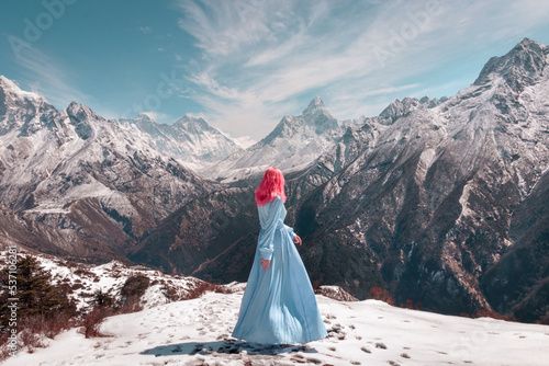 Girl in snow mountains