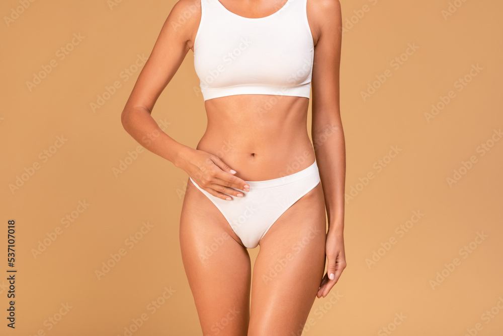 Premium Photo  Cropped view of unrecognizable woman in beige