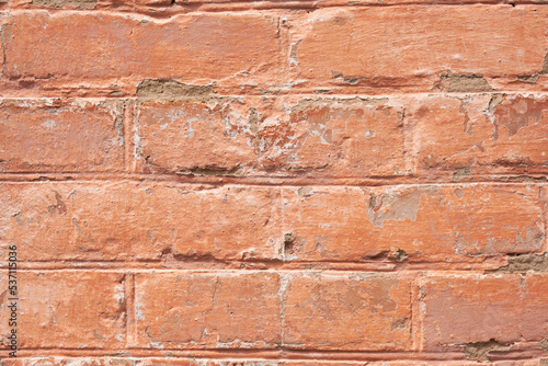 red painted brick wall