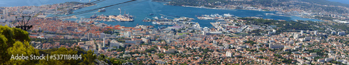 A scenic view of the city of Toulon from a hill called Mount Faron .