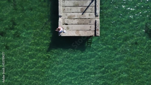 Aerial view of a wooden dock over the Lake of Pogradec in Albania photo