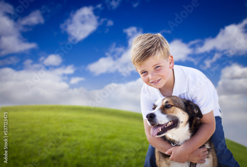 Handsome Young Boy Playing ...