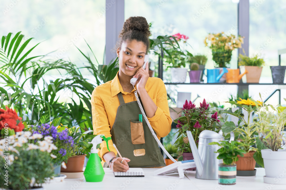 Florist taking orders over the phone Florist taking orders over the phone