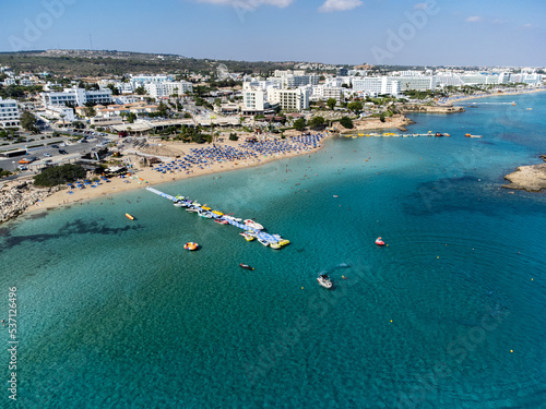 Aerial panoramic view on holidays resorts and blue crystal clear water on Mediterranean sea near Fig Tree beach, Protaras, Cyprus © barmalini