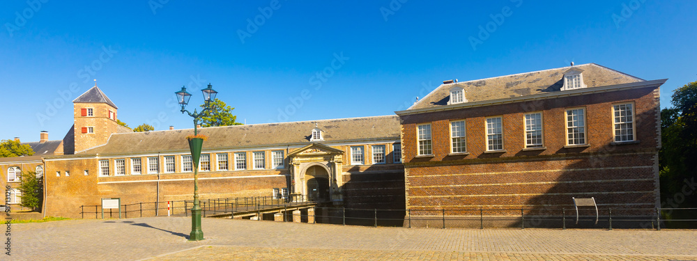 Fototapeta premium Picturesque summer landscape with a view of Breda Castle, located in the historical center of Breda, Netherlands