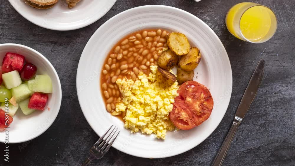 Roasting English Breakfast with Beans and Scrambled Eggs Roasting English Breakfast with Beans and Scrambled Eggs