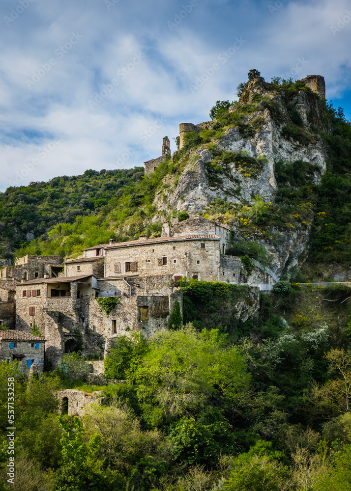 View on Rochecolombe medieval village, perched on its hill in the South of France (Ardeche)