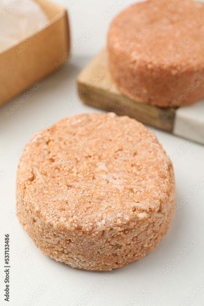 Natural solid shampoo bars on light table Natural solid shampoo bars on light table