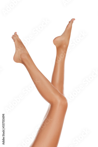 Woman with beautiful long legs on white background, closeup © New Africa