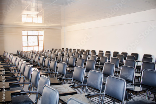 empty classroom, empty conference room, empty auditorium. abandonment, desertion, war, pandemic © Tom