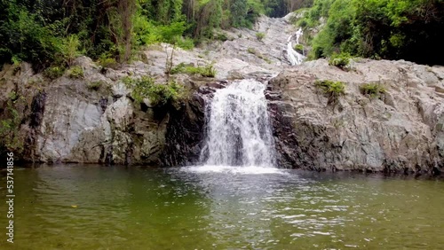 View of the beautiful waterfall in the tairona park, Colombia. photo