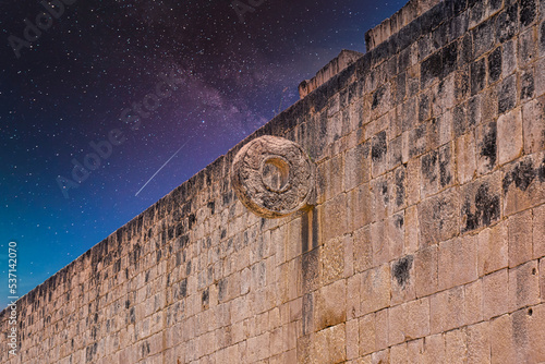 Detail of hoop ring at ball game court, Gran Juego de Pelota of Chichen Itza archaeological site in Yucatan, Mexico with Milky Way Galaxy stars night sky photo