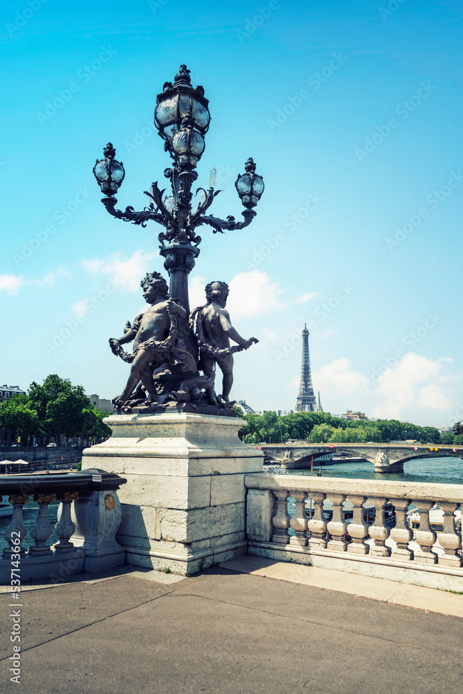 Eiffel Tower viewed from Alexandre III bridge in Paris