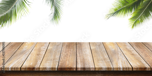 Empty of wooden table top with a coconut green leaf on white background. For montage product display or design key visual layouts.