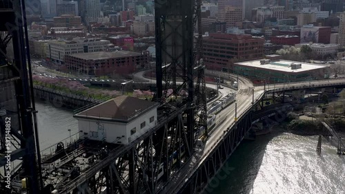 Light rail passenger train passing over bridge in Portland Oregon.