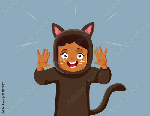 Halloween Girl Wearing a Cat Costume Vector Cartoon Illustration. Funny child wearing a disguise outfit for a carnival costume party
