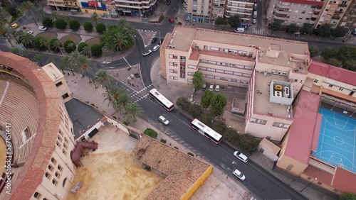 Alicante, Spain. Aerial View of Plaza de Toros Bullring and Residential Neighborhood, Revealing Drone Shot photo