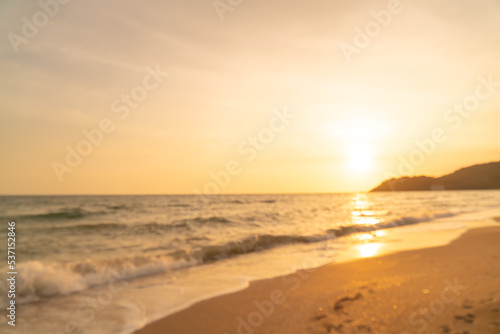 abstract blur beautiful sea beach with sunset time for background