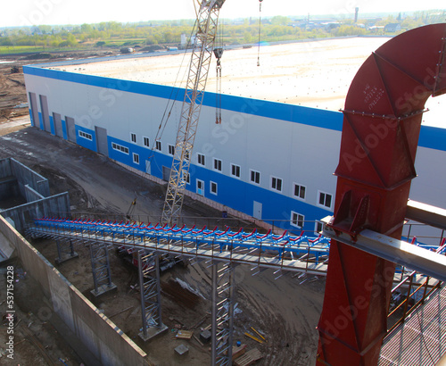 construction of aconstruction of a plant made of metal and reinforced concrete materials plant made of metal and reinforced concrete materials photo