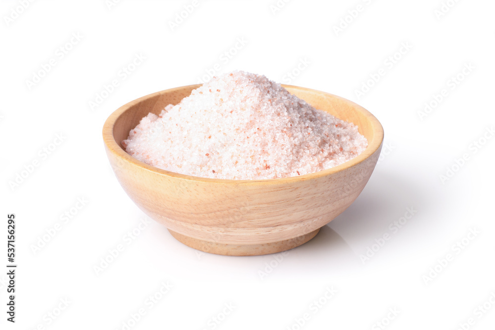 Pink himalayan salt in wooden bowl isolated on white background with clipping path. Pink himalayan salt in wooden bowl isolated on white background with clipping path.