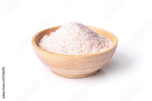 Pink himalayan salt in wooden bowl isolated on white background with clipping path.