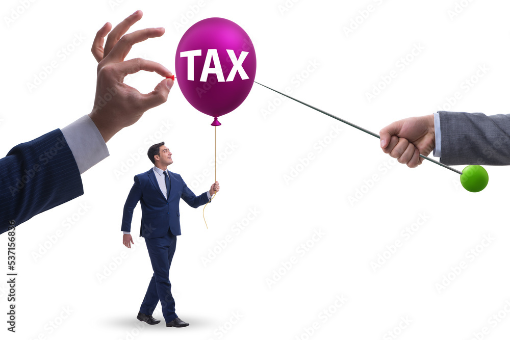 Businessman in tax balloon concept Businessman in tax balloon concept
